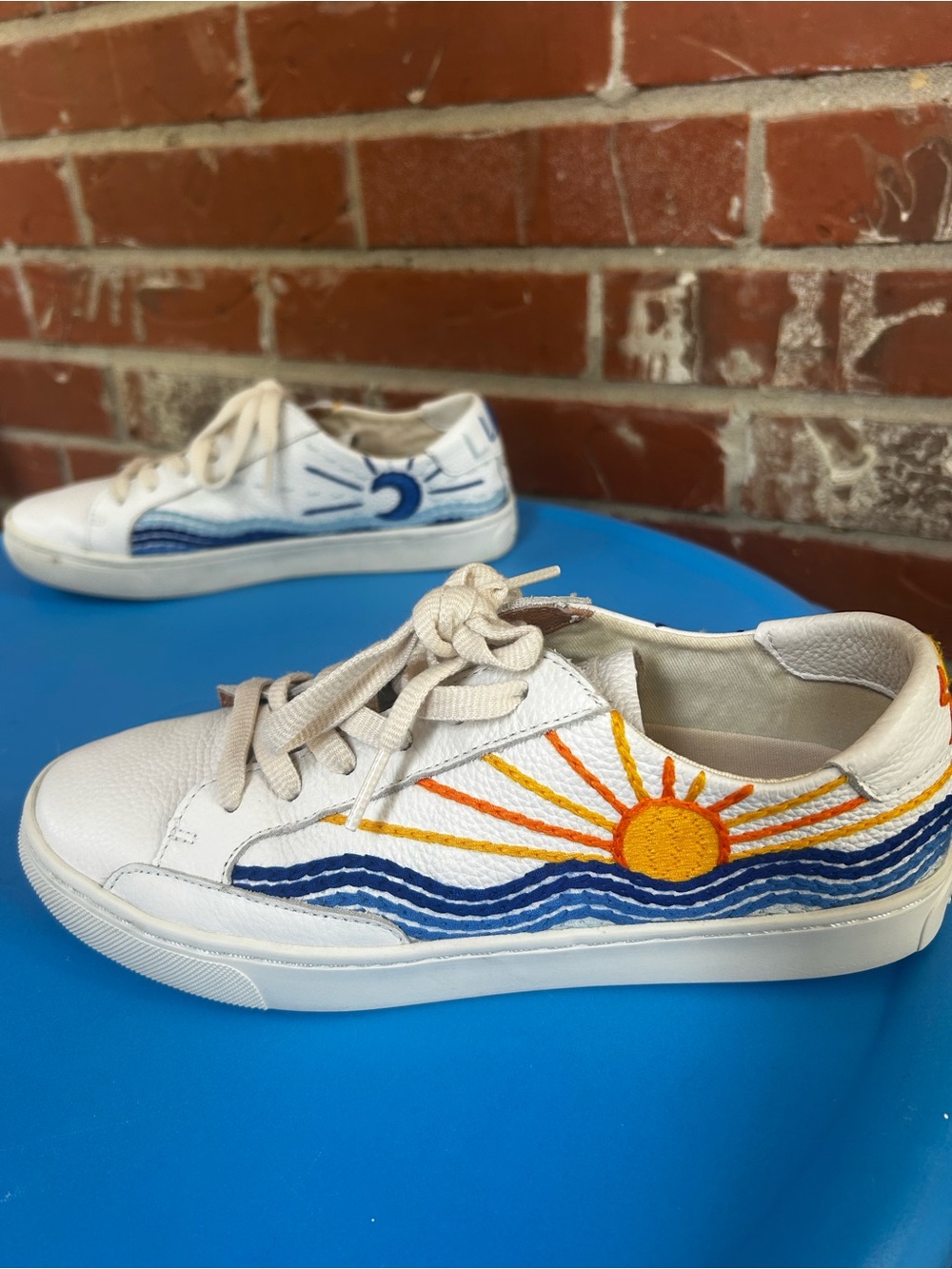Soludos White Sneakers with Orange Sun & Blue Wave Embroidery